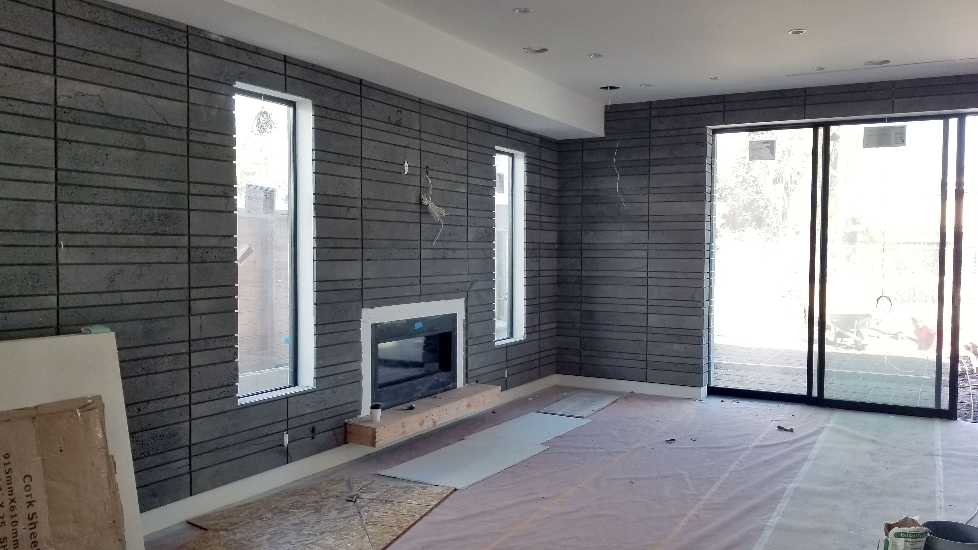 Norstone Planc Large Format Tile on interior feature wall with fireplace in Hollywood, CA
